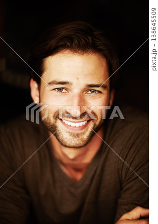 Portrait, smile and fashion of man in studio isolated on a black background. Face, confidence and handsome, happy and attractive model in casual clothes, trendy or stylish on dark backdrop in Brazil 138645509