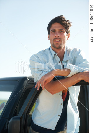 Freedom, portrait and man in car on road trip at door, travel and desert adventure for summer vacation. Transport, holiday journey and calm person standing at van in nature, sunshine and countryside. Freedom, portrait and man in car on road trip at door, travel and desert adventure for summer vacation. Transport, holiday journey and calm person standing at van in nature, sunshine and countryside. 138645814