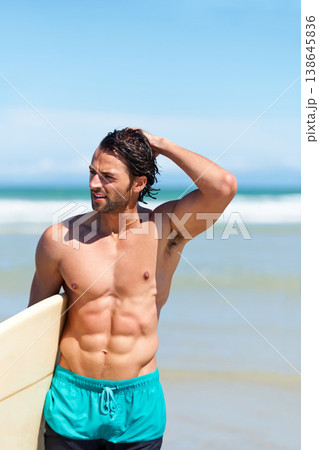 Beach sports, fitness or surfing man ready for activity, shirtless or outdoor nature wellness on Hawaii vacation. Surfboard, muscular athlete body or holiday surfer for exercise, workout or adventure Beach sports, fitness or surfing man ready for activity, shirtless or outdoor nature wellness on Hawaii vacation. Surfboard, muscular athlete body or holiday surfer for exercise, workout or adventure 138645836