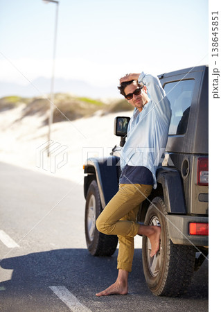 Road trip, travel and man waiting for car help, support or service on road journey, summer adventure or street transportation. Automobile break, patience and person leaning on SUV, van or vehicle Road trip, travel and man waiting for car help, support or service on road journey, summer adventure or street transportation. Automobile break, patience and person leaning on SUV, van or vehicle 138645851