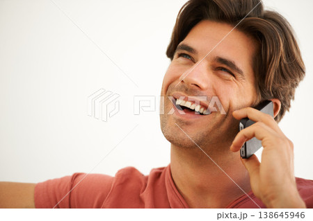 Happy, man and thinking in home with phone call, mobile contact and digital communication with mockup space. Face, laughing and talking on smartphone for chat, funny conversation and tech connection 138645946