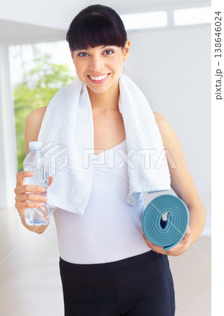 Portrait, yoga and woman with a water bottle, exercise and challenge with hydration, towel and sports. Person, healthy girl or athlete with liquid, smile or workout with training, thirsty or wellness 138646024