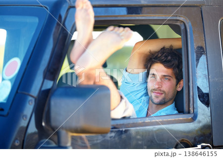 Road trip, man or feet on window of transport for relax, peace and adventure with travel or destination. Person, tourist or traveler with chilling on vacation, holiday or traveling journey in nature 138646155