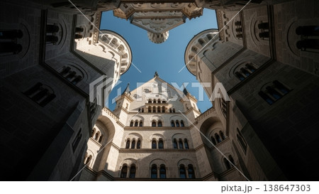 Architecture - Neuschwanstein Castle Courtyard Viewed from Below Upward Angle Romanesque Revival Stone Towers Blue Sky 138647303