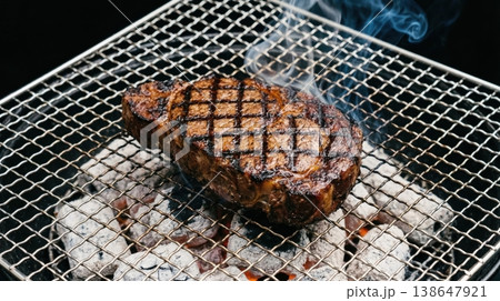 Minimalist Reverse-Seared Steak on Pristine Ember Grate 138647921