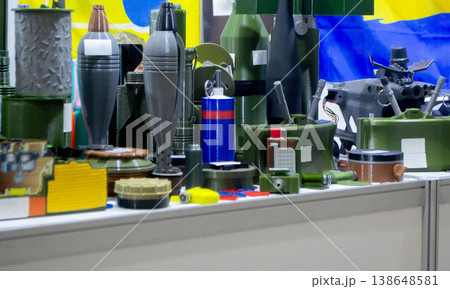 Various military-grade items printed on 3D printers. Prototype of ammunition mina petal, anti-tank, anti-personnel mines, high-explosive fragmentation mortar mines printed on 3D printer. 3D printing Various military-grade items printed on 3D printers. Prototype of ammunition mina petal, anti-tank, anti-personnel mines, high-explosive fragmentation mortar mines printed on 3D printer. 3D printing 138648581