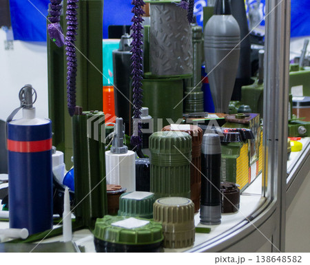 Various military-grade items printed on 3D printers. Prototype of ammunition mina petal, anti-tank, anti-personnel mines printed on 3D printer. Innovation new modern additive technologies. 3D printing 138648582