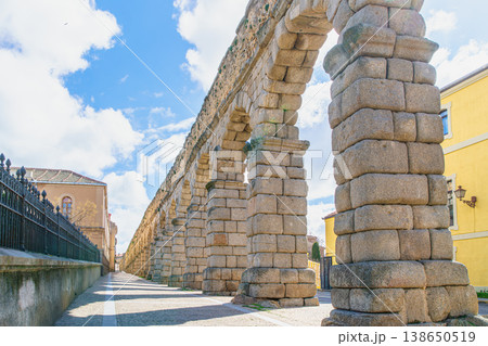 Roman Aqueduct of Segovia in Spain under Blue Sky 138650519