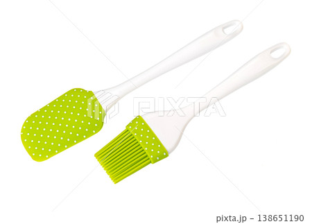 Green silicone spatula and pastry brush for baking 138651190