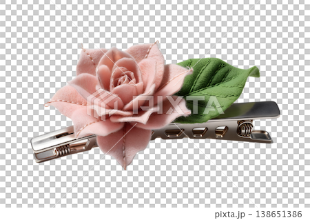 Delicate pink rose flower hair clip accessory, isolated or on a clean background, representing beauty, bridal styling, and feminine fashion accessories 138651386