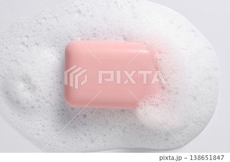Pink soap with foam on a white background. 138651847