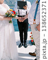 Lovers Exchanging Promises On Pier. Smiling Couple Exchanging Heartfelt Vows By Ocean 138652371