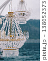 Magnificent Glass Lighting Fixtures Suspended Above Still Waters Create Aura Of Elegance And Purity 138652373