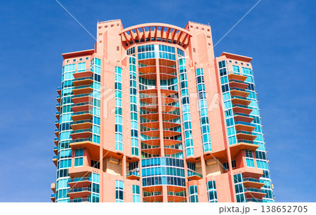 Modern condominium building. Architectural building in neighborhood. Building perspective. Condominium architecture. Architecture of residential building. Residential house. Luxury condominium living 138652705
