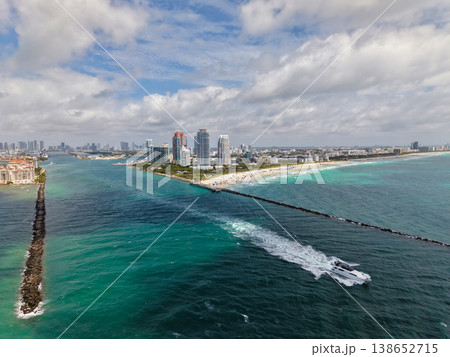 Luxury yacht cruising near Miami skyline. Aerial view of boats on turquoise waters in Miami. Yacht retreat in South Florida Miami. Miami cityscape with sailing vessels. Waterfront Miamis panorama. 138652715
