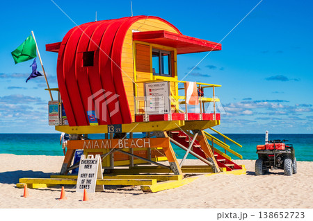 Miami pier. Jetty lifeguard tower on Miami Beach. Scenic view of Miami Beach coastline. Famous South Beach lifeguard. Tropical paradise in Miami. Art Deco lifeguard on Miamis beach. 138652723