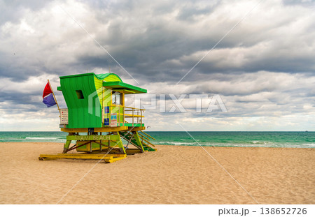 Miami Beach. Lifeguard tower on South Miami Beach. Miami Beach coastline. Famous Beach lifeguard. Travel to Miami. Art Deco lifeguard on Miamis shoreline. Jetty lifeguard tower. 138652726