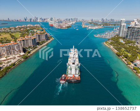 Miami, Florida, USA - March 20, 2025: Cargo Seaboard Explorer container ship, aerial view. Freight container cargo vessel and tugboat. Cargo ship vessel. Miami port. Container Monrovia ship Miami, Florida, USA - March 20, 2025: Cargo Seaboard Explorer container ship, aerial view. Freight container cargo vessel and tugboat. Cargo ship vessel. Miami port. Container Monrovia ship 138652737
