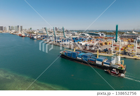 Miami, Florida, USA - March 20, 2025: Cargo Warnow Whale Limassol ship with container in Miami aerial. Freight container on cargo vessel. Cargo ship vessel. Miami port. Container ship Miami, Florida, USA - March 20, 2025: Cargo Warnow Whale Limassol ship with container in Miami aerial. Freight container on cargo vessel. Cargo ship vessel. Miami port. Container ship 138652756
