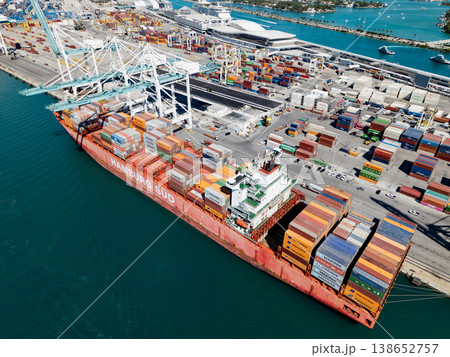 Miami, Florida, USA - March 20, 2025: Cargo Hamburg Sud ship services with container in Miami, aerial view. Freight container on cargo vessel. Cargo ship vessel. Miami port. Container ship 138652757