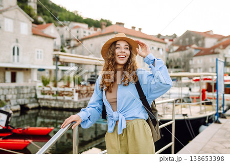 Happy woman tourist enjoying beautiful cityscape top view. Europe travel. Lifestyle, vacation. 138653398