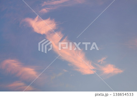 Pink sunset cirrus clouds on evening sky Pink sunset cirrus clouds on evening sky 138654533