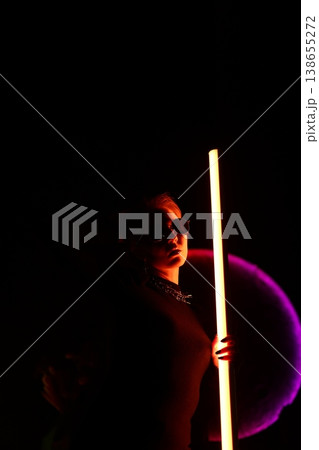 Peaceful setting revealing clandestine actions illuminated by neon lights Peaceful setting revealing clandestine actions illuminated by neon lights 138655272