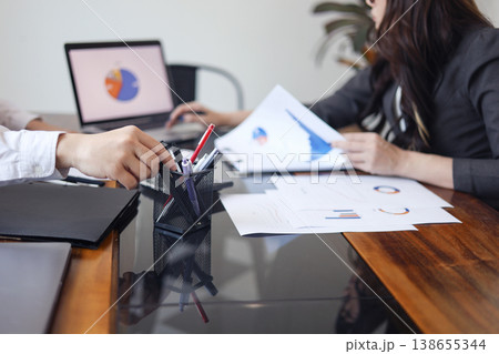 Business people meeting for brainstorming, discussing and analyzing. Business people meeting for brainstorming, discussing and analyzing. 138655344