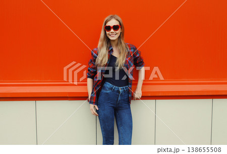happy young woman with red sunglasses, smiling girl in the city 138655508