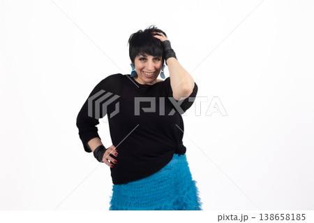 Confident woman in black clothes posing with hand on head Confident woman in black clothes posing with hand on head 138658185