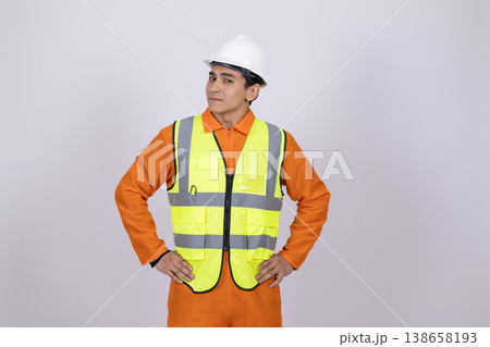 Builder in safety gear looking at the camera 138658193