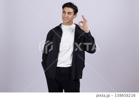 Man in black jacket adjusting his glasses and looking aside Man in black jacket adjusting his glasses and looking aside 138658216