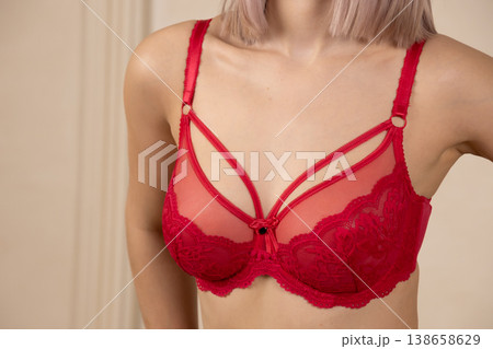 Detailed view of red lace lingerie on a woman 138658629