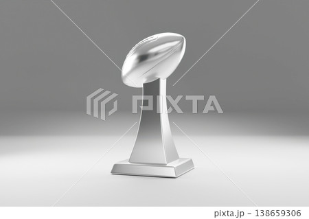 Silver trophy cup standing on a white round pedestal Silver trophy cup standing on a white round pedestal 138659306