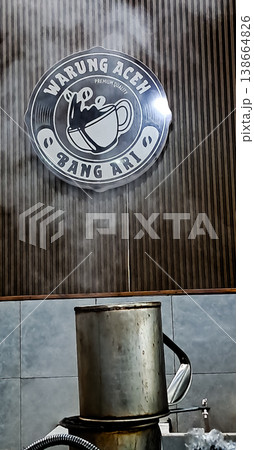 Kebayoran, Jakarta, January 22, 2026: Close-up view of a kettle making traditional coffee 138664826
