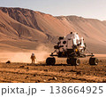 火星表面の宇宙飛行士と探査ローバー、岩石砂漠の荒野と山々を背景にした宇宙ミッション 138664925