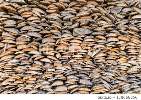 Stacked wooden slices arranged in a textured pattern for background Stacked wooden slices arranged in a textured pattern for background 138666856