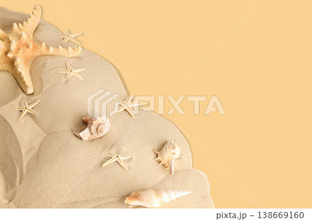 Seashells and starfish sitting on soft sand beach Seashells and starfish sitting on soft sand beach 138669160