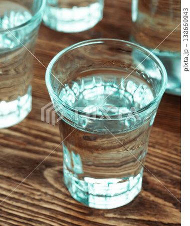 Vertical vodka bottle and shots 138669943