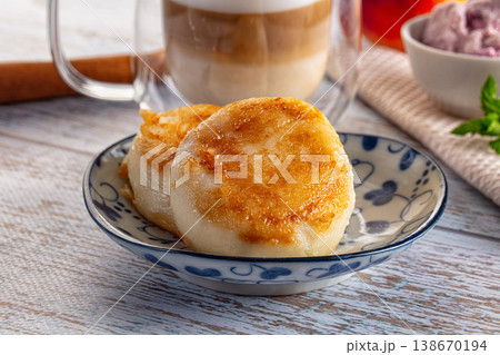 Fried homemade cottage cheese syrniki Fried homemade cottage cheese syrniki 138670194