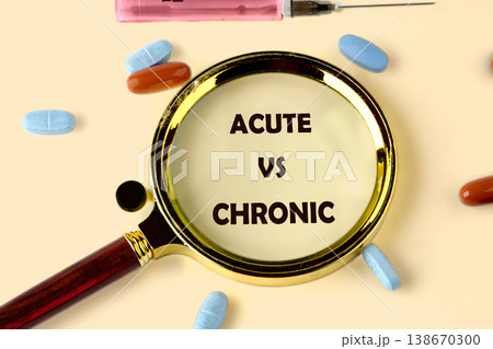 A magnifying glass focuses on ACUTE VS CHRONIC text, surrounded by diverse blue and orange pills and a pink syringe, illustrating medical conditions A magnifying glass focuses on ACUTE VS CHRONIC text, surrounded by diverse blue and orange pills and a pink syringe, illustrating medical conditions 138670300