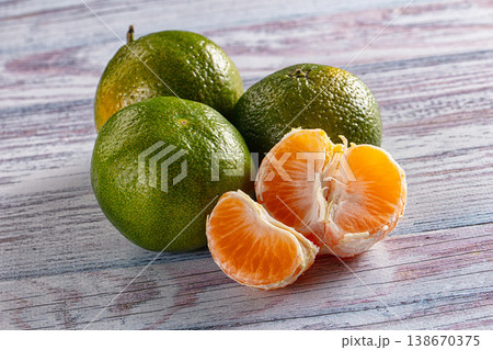 Sweet green juicy tangerin heap Sweet green juicy tangerin heap 138670375