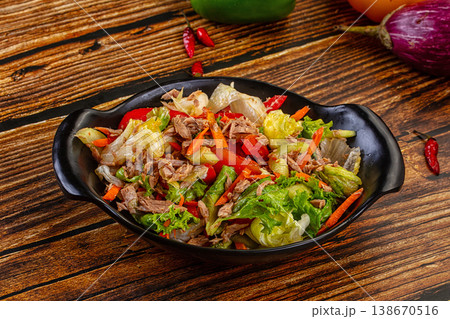 Fresh Tuna Salad with Vegetables in a Bowl on a Rustic Wooden Table Fresh Tuna Salad with Vegetables in a Bowl on a Rustic Wooden Table 138670516