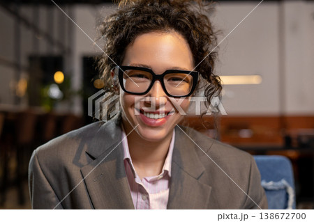 Confident woman looking at camera in office 138672700