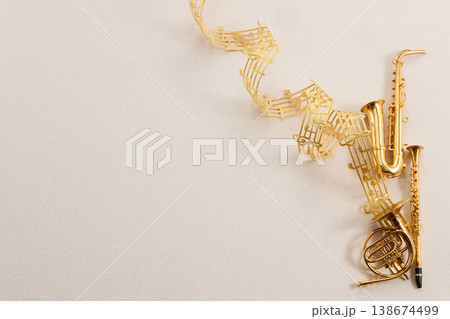 World music day. Golden musical instruments creating an elegant melody World music day. Golden musical instruments creating an elegant melody 138674499