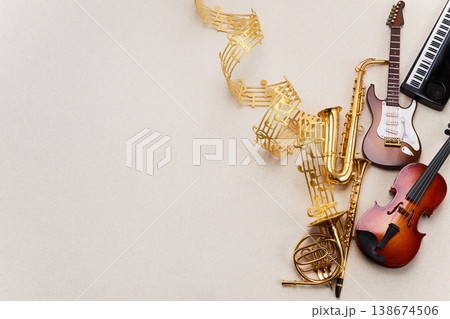World music day. Musical instruments forming a composition with flowing music notes 138674506