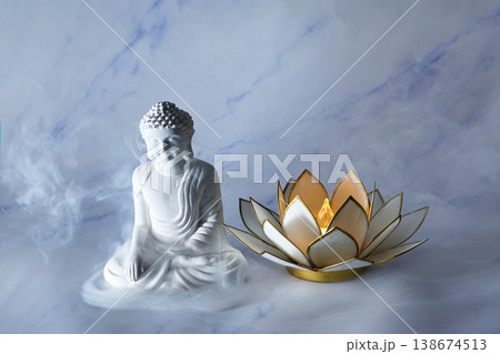 Vesak Buddha birthday. Buddha statue and lotus flower meditating with smoke Vesak Buddha birthday. Buddha statue and lotus flower meditating with smoke 138674513