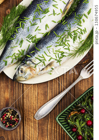 Salted Herring with Fresh Dill and Chives on Plate Salted Herring with Fresh Dill and Chives on Plate 138674955