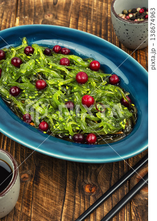 Fresh seaweed salad with cranberries, clean eating concept. Fresh seaweed salad with cranberries, clean eating concept. 138674963