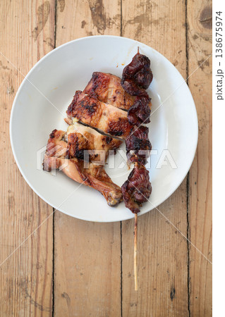 Grilled Chicken Thigh and Liver Skewer Yakitori on White Plate Top View Wooden Table Copy Space Grilled Chicken Thigh and Liver Skewer Yakitori on White Plate Top View Wooden Table Copy Space 138675974